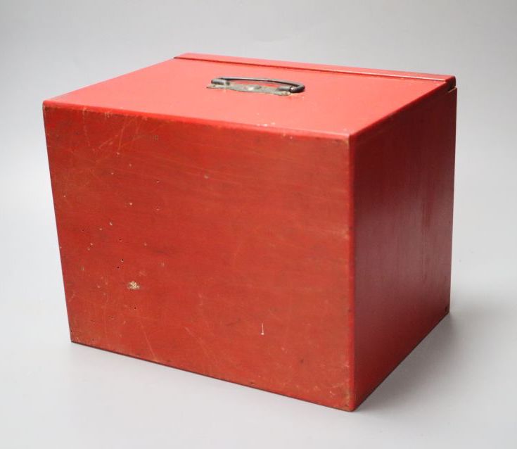 A Mah Jong set in red stained wood case
